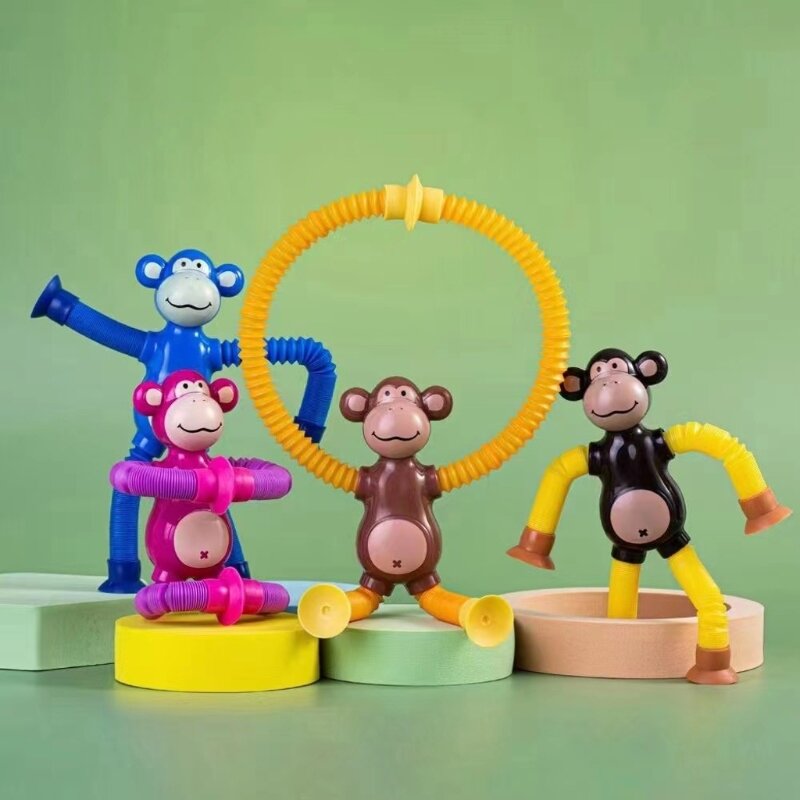 Juguete sensorial con ventosa telescópica con forma mono dibujos animados, juguete con ventosa extensible, envío directo