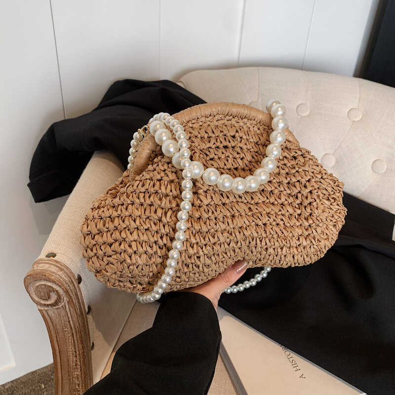 Tas klip tas Musim Panas 2024 tas tangan desainer tas jerami tas tangan untuk wanita Antik rantai mutiara tas bahu selempang Hobo