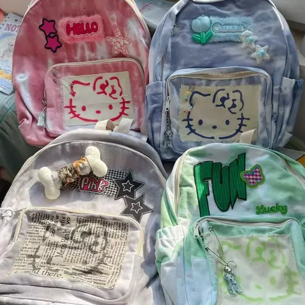 Новый оригинальный рюкзак Sanrio в стиле ретро с изображением милого котенка для девушек ручной работы с контрастной цветовой текстурой для колледжа