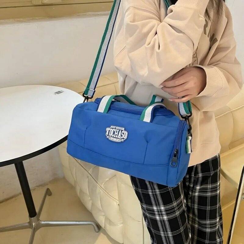 กระเป๋าถือเด็กน้ำหนักเบาไนลอนแฟชั่นกระเป๋าสะพายไหล่สีสันสดใสกระเป๋าเดินทางความจุขนาดใหญ่ผู้ใหญ่