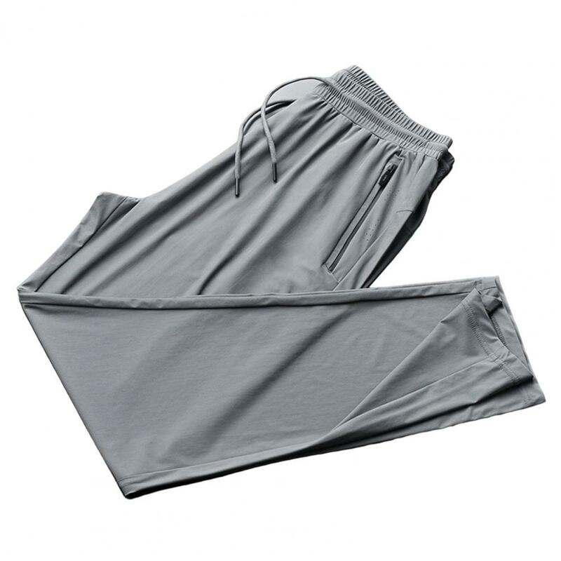Pantalones de chándal de malla con bolsillos y cremallera para hombre, ropa deportiva informal con absorción de sudor, talla grande