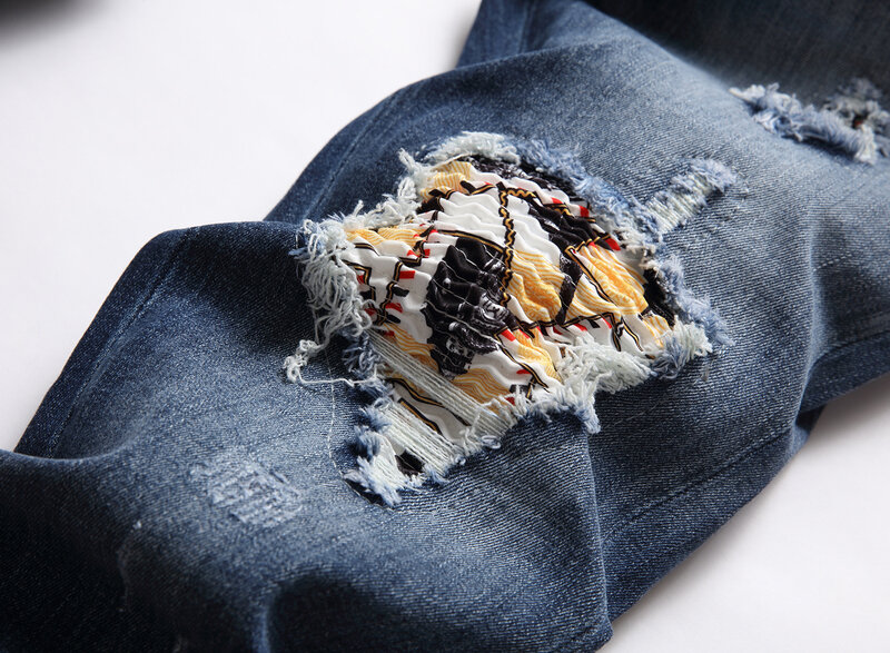 Falten und Löcher in Jeans Männer dehnen schlanke Füße Mode Großhandel Hersteller Direkt vertrieb