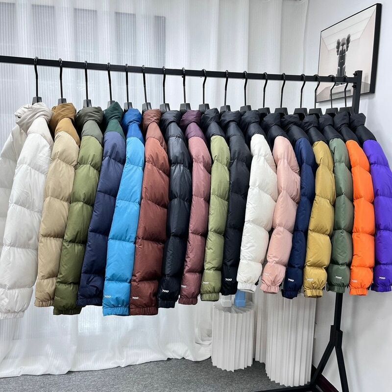 2023 Herbst und Winter Daunen Baumwolle gepolsterter Mantel Kapuzen-Stehkragen dicker warmer bestickter Mantel für Männer und Frauen