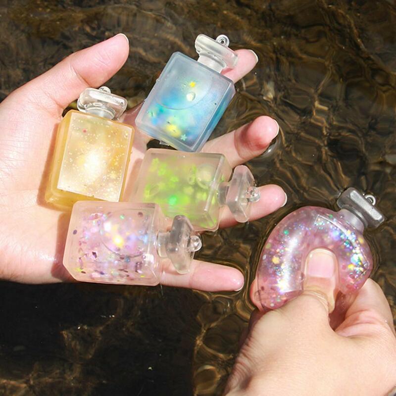 Juguete para apretar botella de Perfume con lentejuelas para niños y adultos, juguete suave para aliviar el estrés, con Linda elasticidad de descompresión