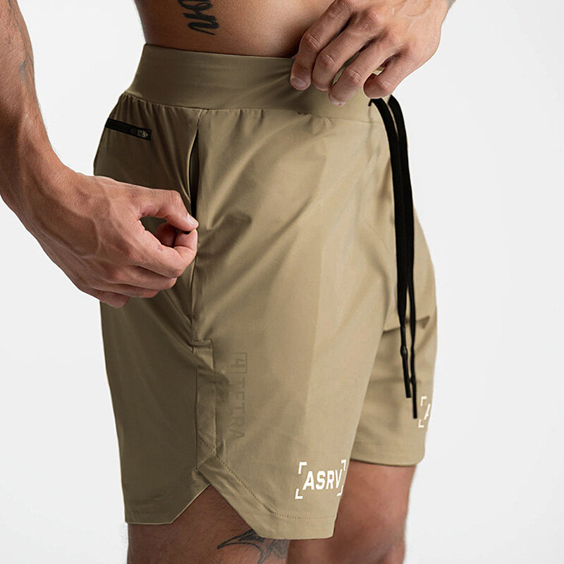 Pantalones cortos de entrenamiento de secado rápido para hombre, ropa deportiva informal, Fitness, correr, rejilla, compresión, atletismo