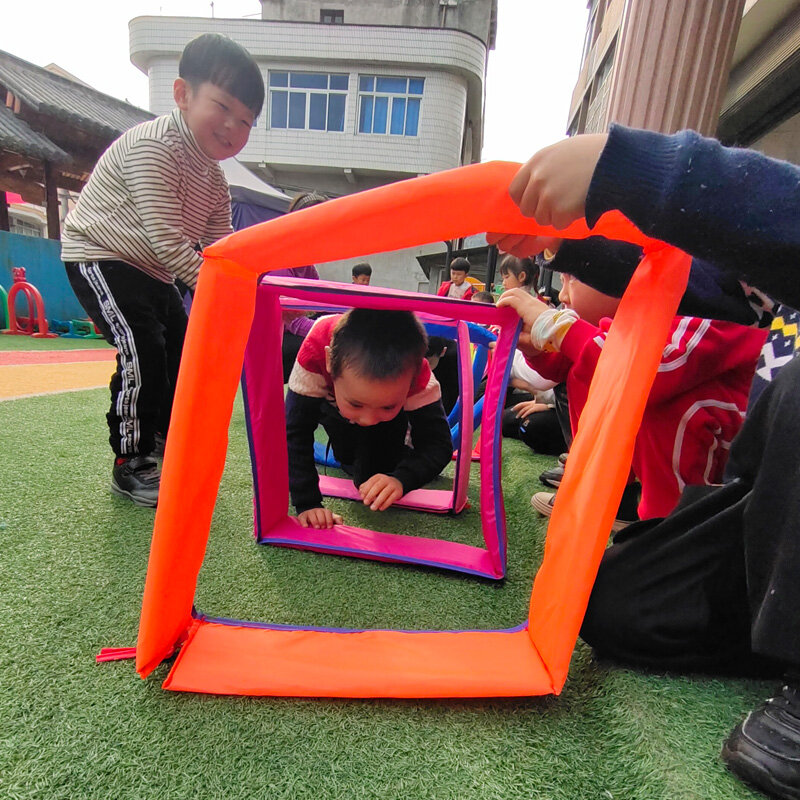 Kind im Freien Spiel Spaß Sport Kindergarten Spiel interessante Körper sensorische Integration Hops cotch Ring Sprung Gitter Kinder Tunnel Spiele