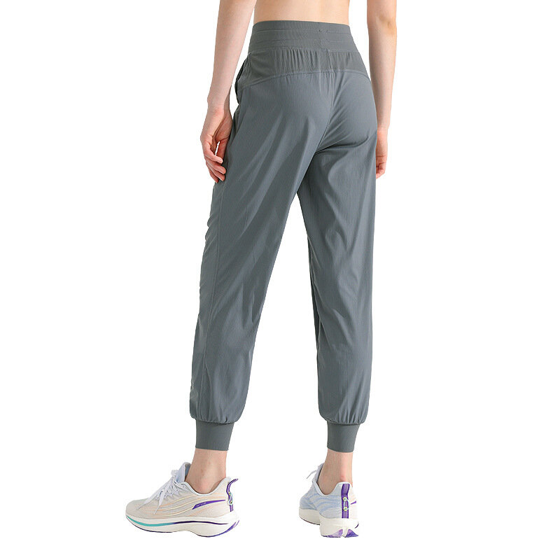 New breathable loose fitting sports pants for women's running training pants, slimming casual yoga fitness pants, and leggings