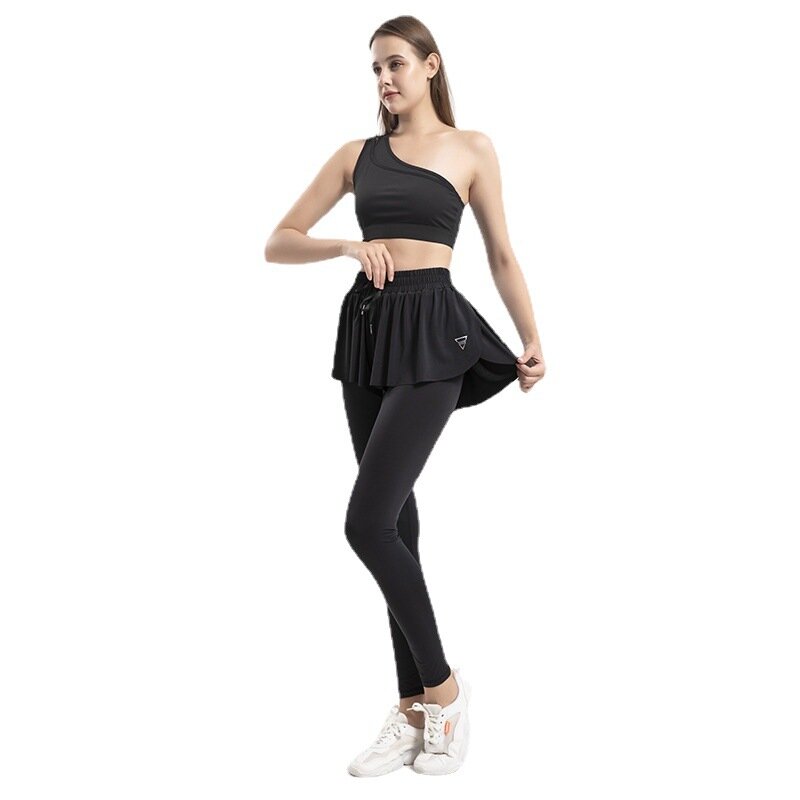Nowe spodnie do jogi fałszywe dwa kawałki Running Fitness sport Anti Glare luźne szybkie suszenie spodnie do fitnessu spódnica ciepła kurtka