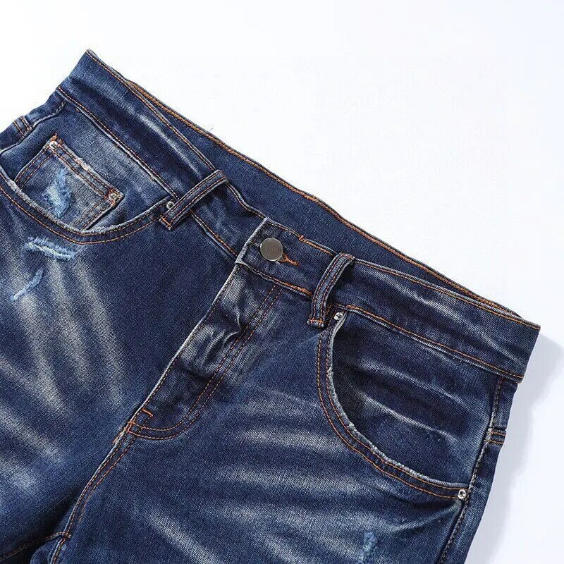 Moda Streetwear uomo Jeans retrò blu scuro Stretch Skinny Fit Jeans strappati uomo stampato Patched Designer pantaloni di marca Hip Hop