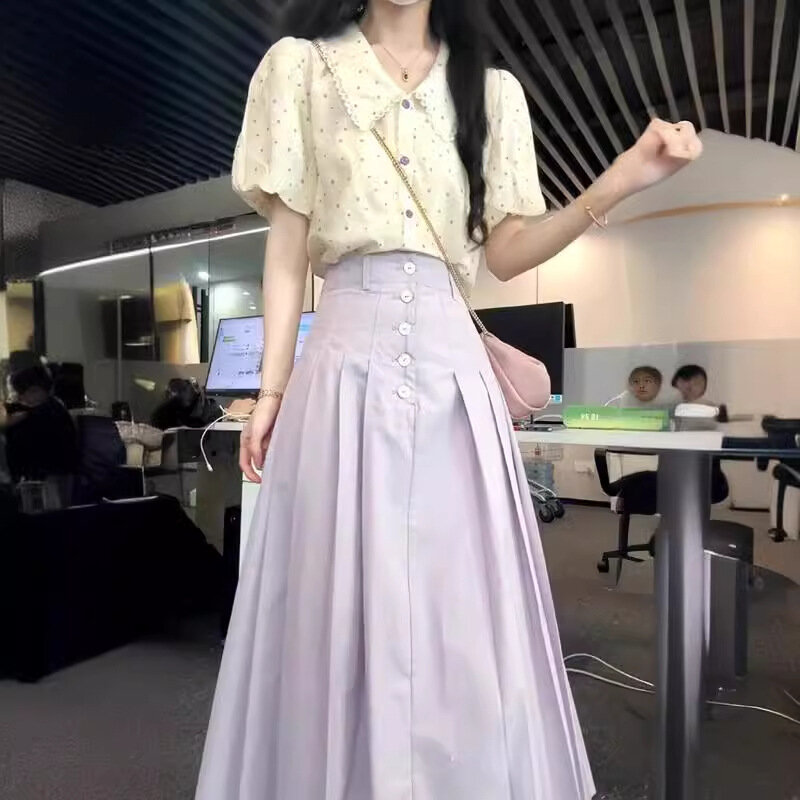 Falda plisada de dos piezas para mujer, traje de moda, diseño de top de lunares, temperamento Delgado, novedad de verano 2024