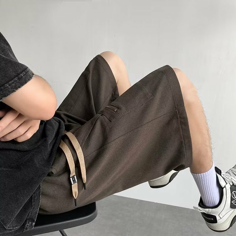 Cargo Shorts Männer solide asymmetrische breite Bein Frühling Sommer Outdoor sportliche Kordel zug Teenager schöne Fitness Mode Chic