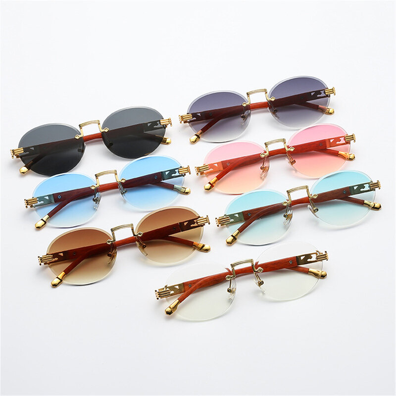 Gafas de sol redondas retro sin marco estilo punk para hombres y mujeres de marca de lujo con montura de diamantes y estampado de leopardo, sin marco, lentes de sol sin categoría Gafas UV400 Goggles