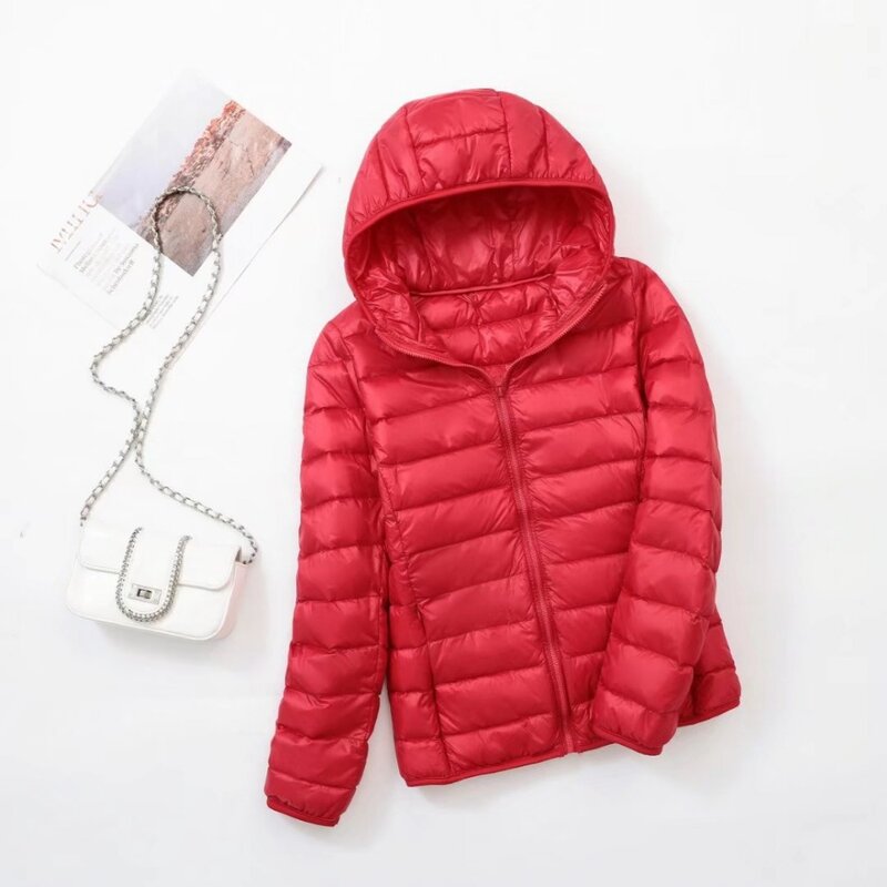 Lekka Plus Size kurtka cienki dół damska 2023 jesienno-zimowa wąska krótka z kapturem ciepła biała płaszcz z kaczego puchu damska odzież wierzchnia