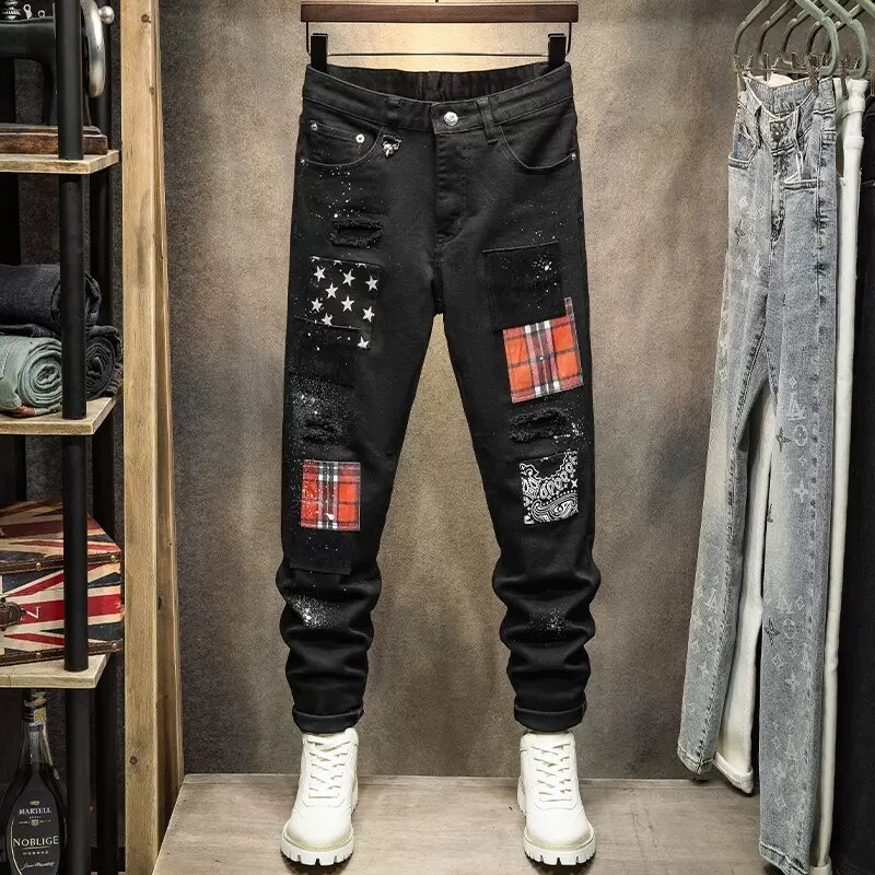 Jeans da uomo di moda High Street Jeans strappati Skinny dipinti elasticizzati neri da uomo pantaloni a matita in Denim Hip Hop firmati con patch