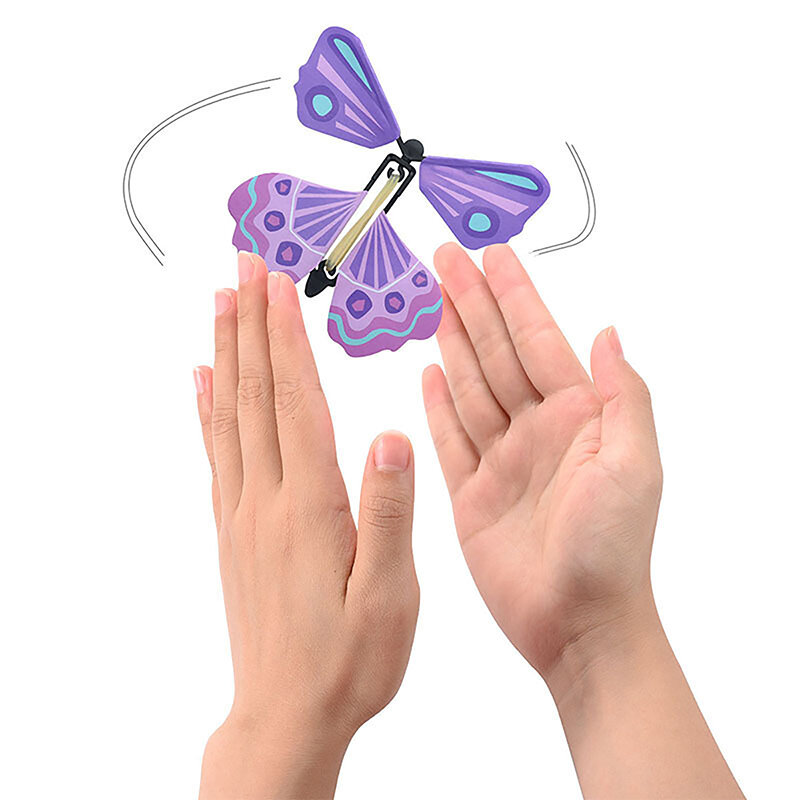 Marcapáginas mágico de mariposas voladoras para niños, juguete de cuerda en el cielo, tarjetas de felicitación, banda de goma alimentada, accesorios mágicos, regalo de Surpris, 1 piezas