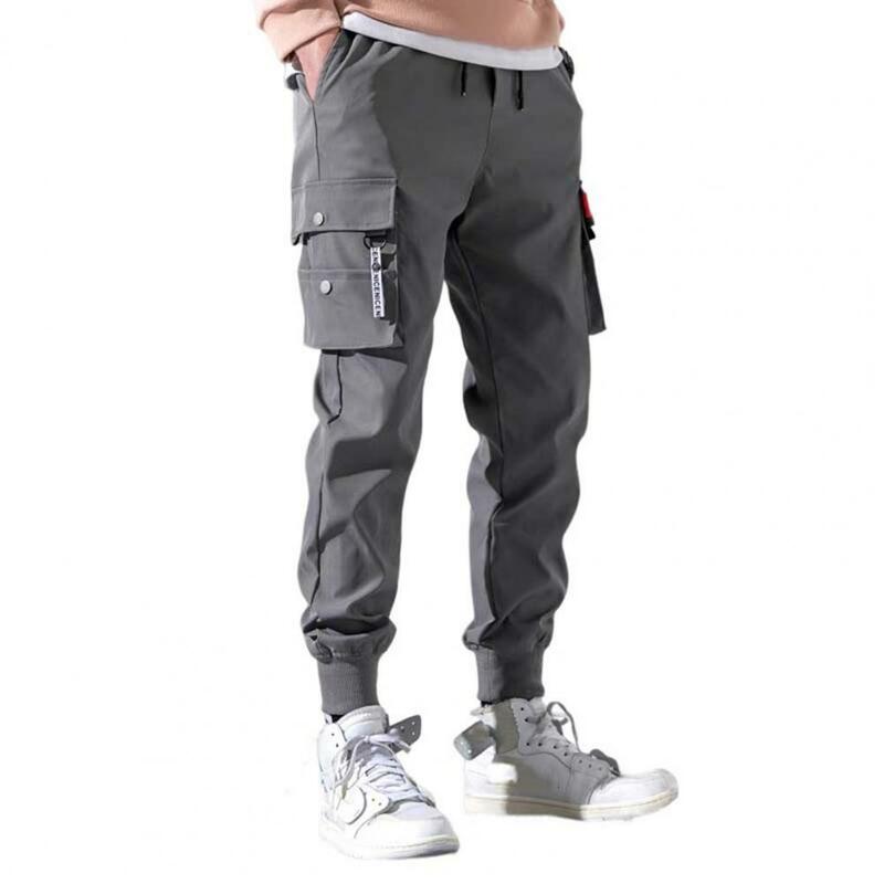 Брюки-карго мужские с эластичным поясом, спортивные штаны со вставными манжетами и завязкой, много карманов, однотонные повседневные