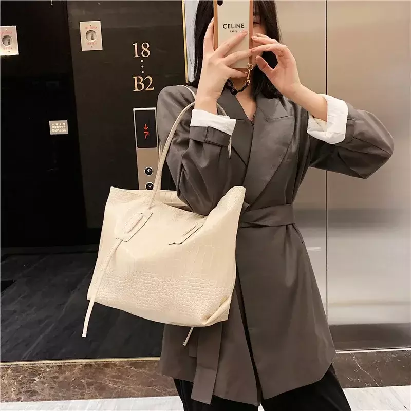 Tas bahu tekstur serbaguna wanita, tas jinjing versi Korea tas bahu kapasitas besar trendi baru
