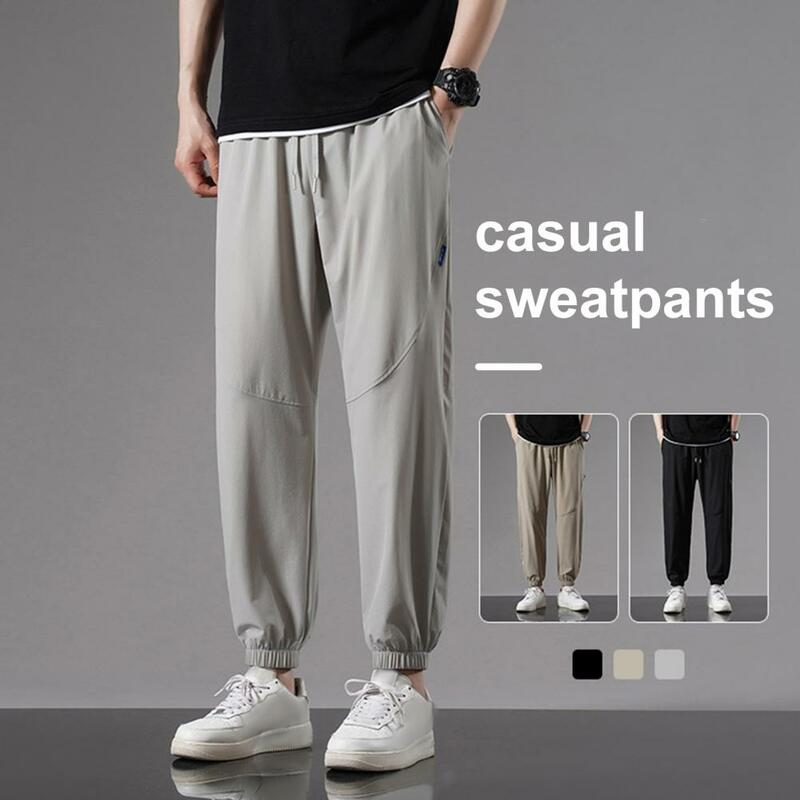 Pantalones deportivos de seda de hielo para hombre, pantalones de secado rápido con bolsillos laterales, cintura elástica con cordón, talla grande, Color sólido para trotar