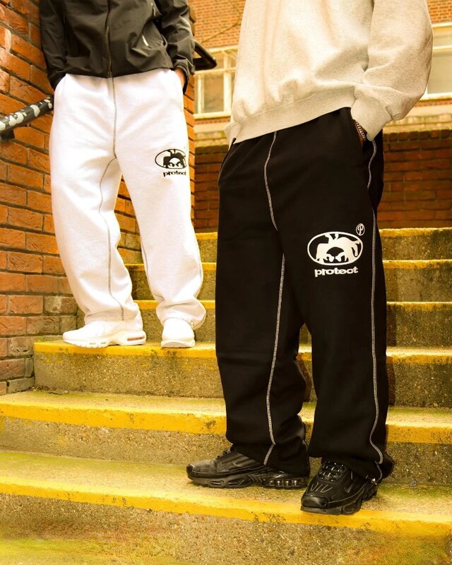 Amerykański Retro haftowane wzór w napisy spodnie dresowe męskie Y2K Street Hip Hop luźna moda dorywczo wysokie spodnie dresowe damskie