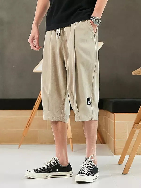 Celana Harem musim panas ukuran Plus celana panjang pria gaya Tiongkok Jogger pendek celana Baggy kasual panjang betis celana Capris pria 8XL