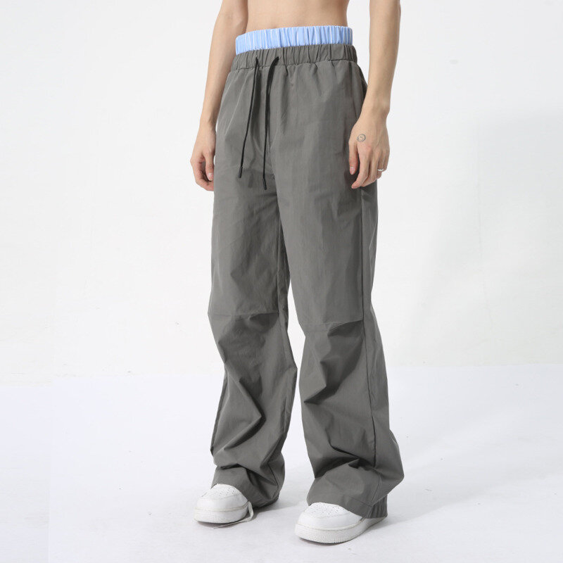 NOYMEI-pantalones de diseño de nicho de moda para hombre, ropa informal de verano, holgados, combinables con todo, Patchwork, Color de contraste, con cordón, WA4405