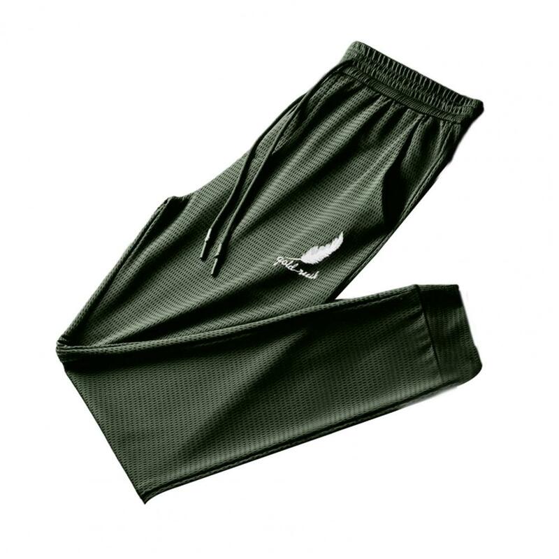 Plus Size pantaloni da uomo Ice Silk Mesh Feather Print coulisse Summer Quick Dry tasche pantaloni sportivi estate