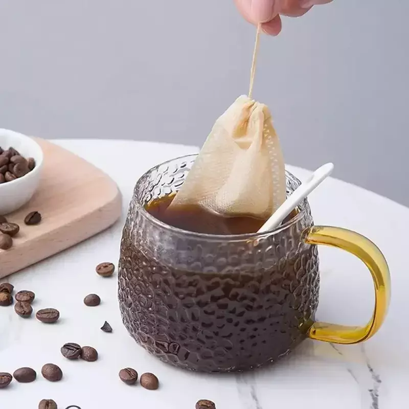 50 buah/lot kantong teh sekali pakai tidak ditenun kain kantong penyaring teh untuk kopi bumbu kantong teh dengan tali penyaring peralatan minum teh dapur