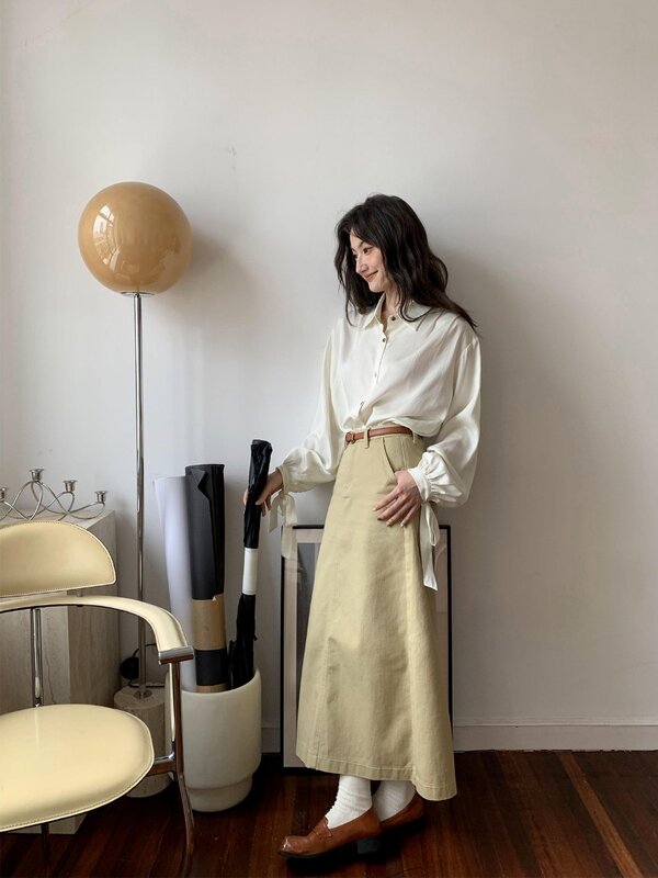Camisa holgada de solapa con lazo para mujer, diseño de Color sólido con sensación única drapeada, Top de moda coreana, novedad de 2024