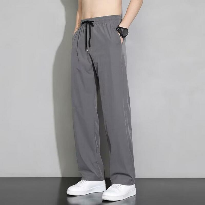 Solid Color Men Pants Quick-drying Men's Sport Pants with Side Pockets Drawstring Waist for Gym Training Jogging Ice Silk Fabric