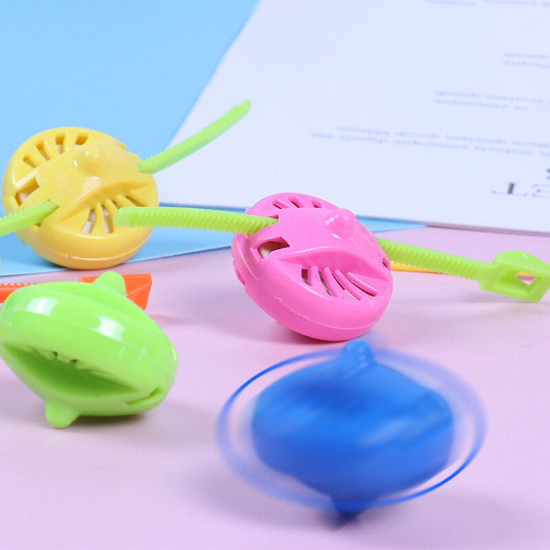 Mainan tradisional intelektual anak-anak, mainan kecil plastik berputar untuk anak-anak