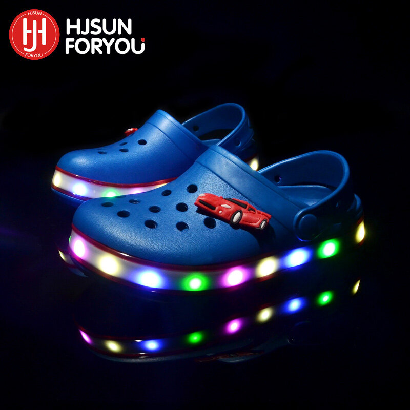 รองเท้าสะท้อนแสงมีไฟ LED สำหรับเด็กในรองเท้าตาข่ายฤดูร้อนรองเท้าแตะชายหาดเด็กหญิงเด็กชายรองเท้าผ้าใบแฟชั่นระบายอากาศได้สำหรับเด็ก
