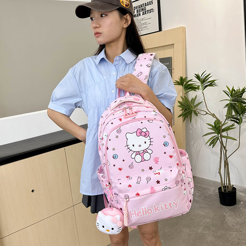 Sanrio mochila escolar de Hello Kitty para estudiantes, gran capacidad, almohadilla de hombro de dibujos animados, mochila de doble hombro ligera informal