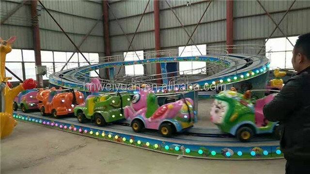 Roller Coaster Mini dalam ruangan untuk anak-anak kustom 5kW bahan plastik Abs terlaris berkendara dinosaurus pada ayunan bayi dalam ruangan 12 bulan