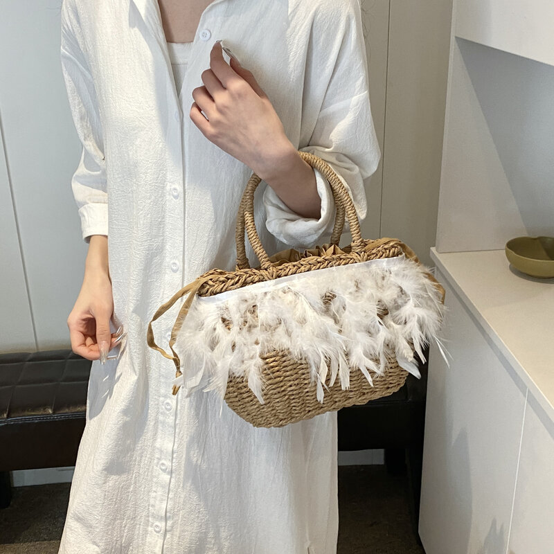 Borsa di paglia bohémien rafia Ratten Handmade bolsa feminina Fashion Feathers borsa intrecciata borsa con manico superiore borsa Shopper da spiaggia 2024