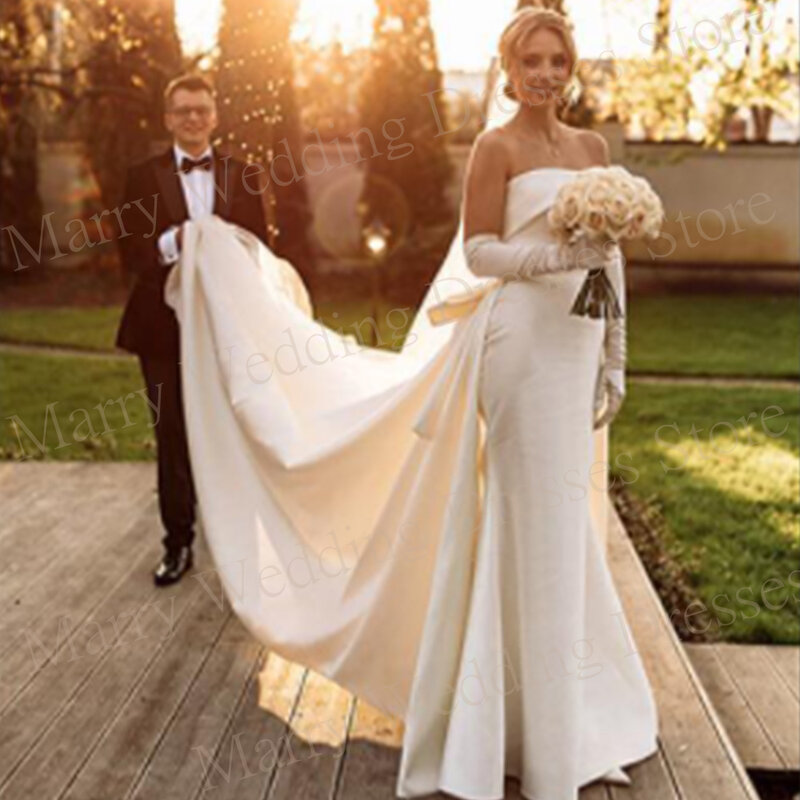 Gaun pernikahan cantik berwarna garis A tanpa tali bahu gaun pengantin pita besar punggung terbuka tanpa lengan panjang lantai sederhana