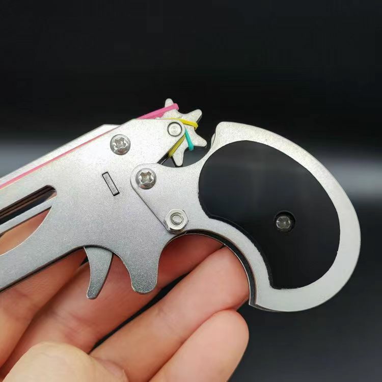 1 Buah Pistol Mainan Baja Tahan Karat Mainan Gelang Karet Lipat Mini Gantungan Kunci Olahraga Luar Ruangan Pistol Mainan Karet untuk Hadiah Pacar