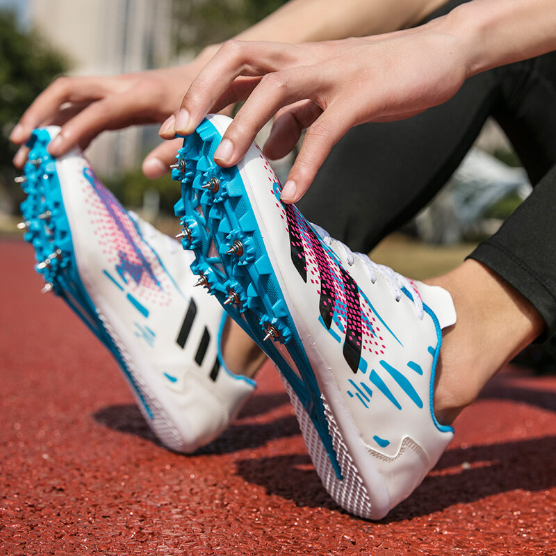 Zapatillas de deporte con pinchos para hombre y mujer, zapatos ligeros de entrenamiento para correr y carreras, novedad de 2021