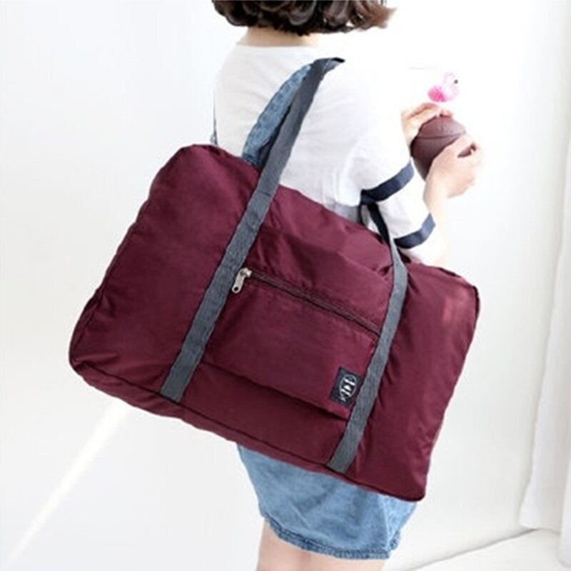 Składana torba podróżna wodoodporne tkaniny damskie torby podróżne o dużej pojemności ręczne torby na ramię Duffle przenośne kostki do pakowania