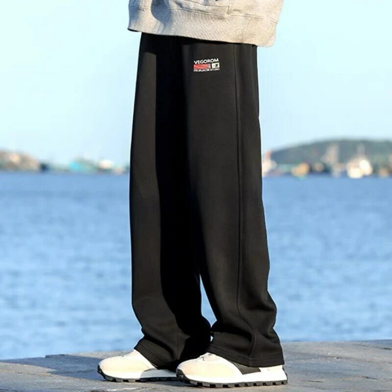 Jednolity kolor casualowe spodnie męskie jesień i zima 2024 nowy luźne spodnie dresowe amerykańska prosta nogawka wysoka talia spodnie pełnej długości mężczyzna