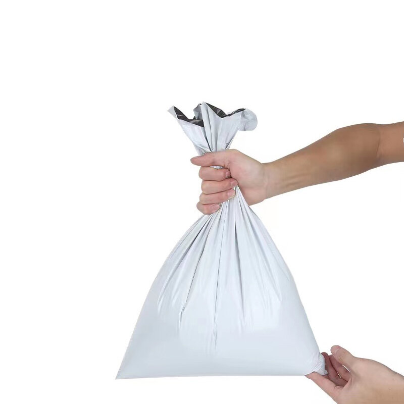 プラスチック封筒または粘着テープ付きの白いビニール袋,粘着性,50およびピース/ロットユニット