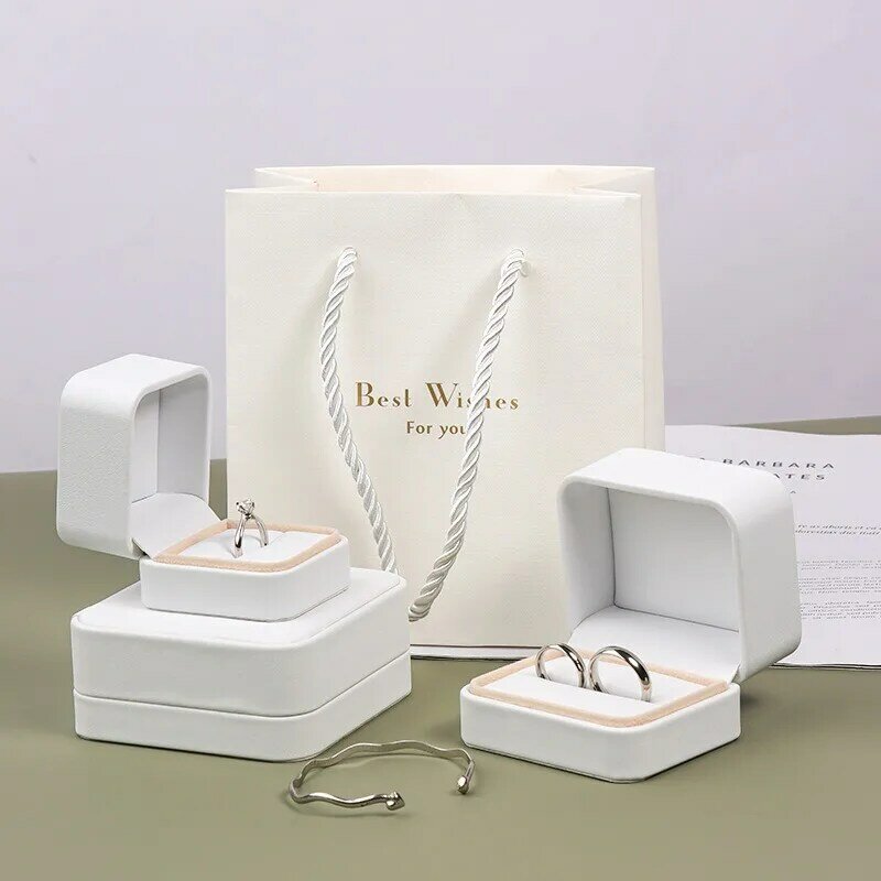 Biała skóra PU pudełko na biżuterię pierścionek naszyjnik kolczyki witryna pudełko na prezent moda prosta na organizator na biżuterię ślubne