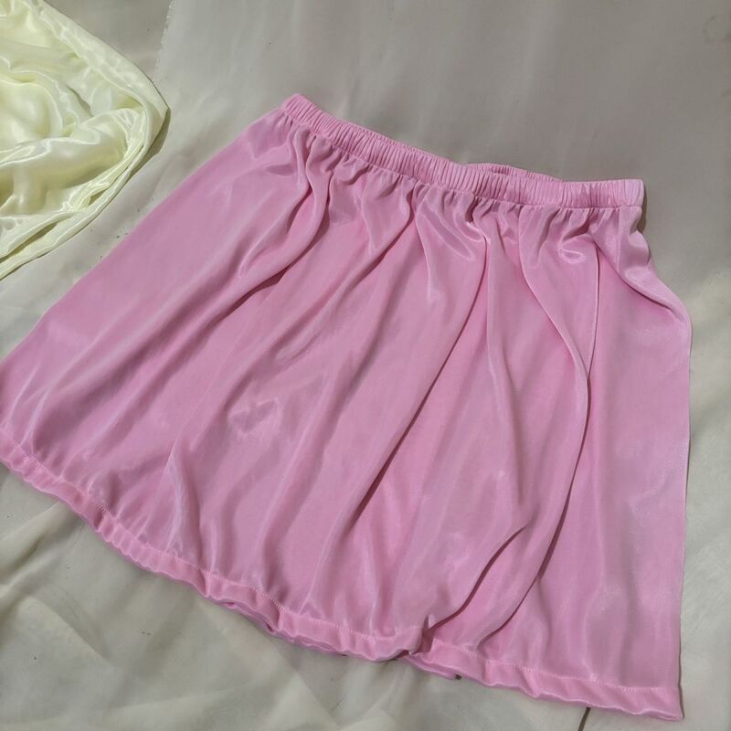 Length 45cm summer glossy see through satin sexy skirt Women a line thin seamless short loose bottoms