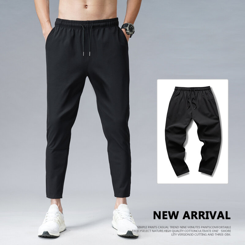 2023 New Korean Ice Silk Men'S Summer Thin Fashion Solid Loose Large Size Casual Pants 9-Point Sports Trousers Small Feet