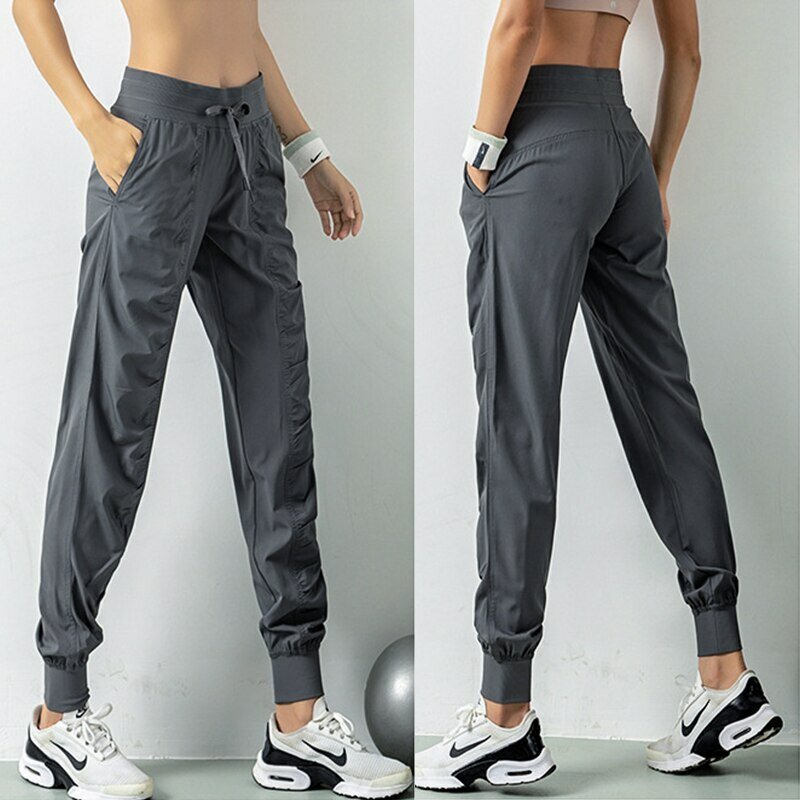 Spodnie sportowe do biegania ze sznurkiem ze sznurkiem damskie szybkoschnące sportowe siłownia spodnie dresowe z dwoma boczne kieszenie spodnie do ćwiczeń