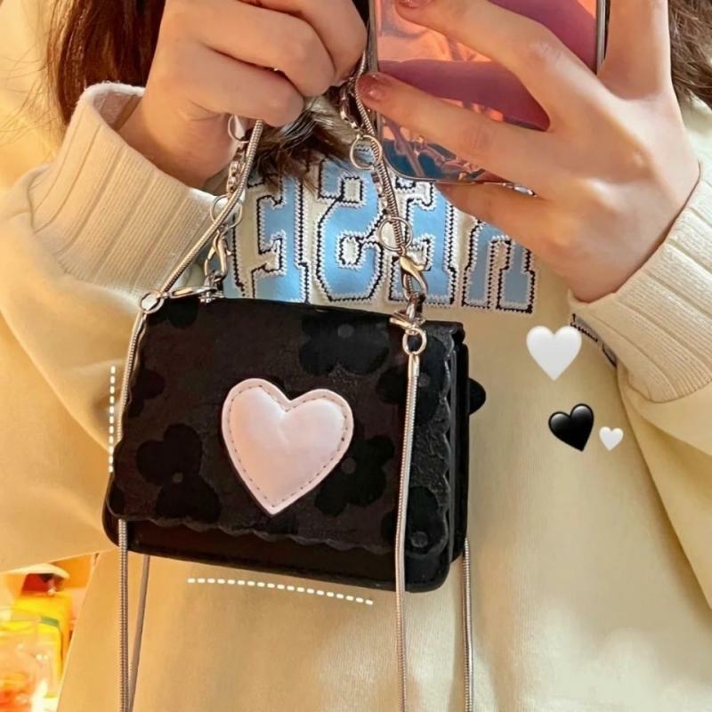 2022 nuova borsa a tracolla alla moda Ins borsa a forma di cuore dolce Mini moneta rossetto borsa a tracolla piccola catena fredda borsa femminile