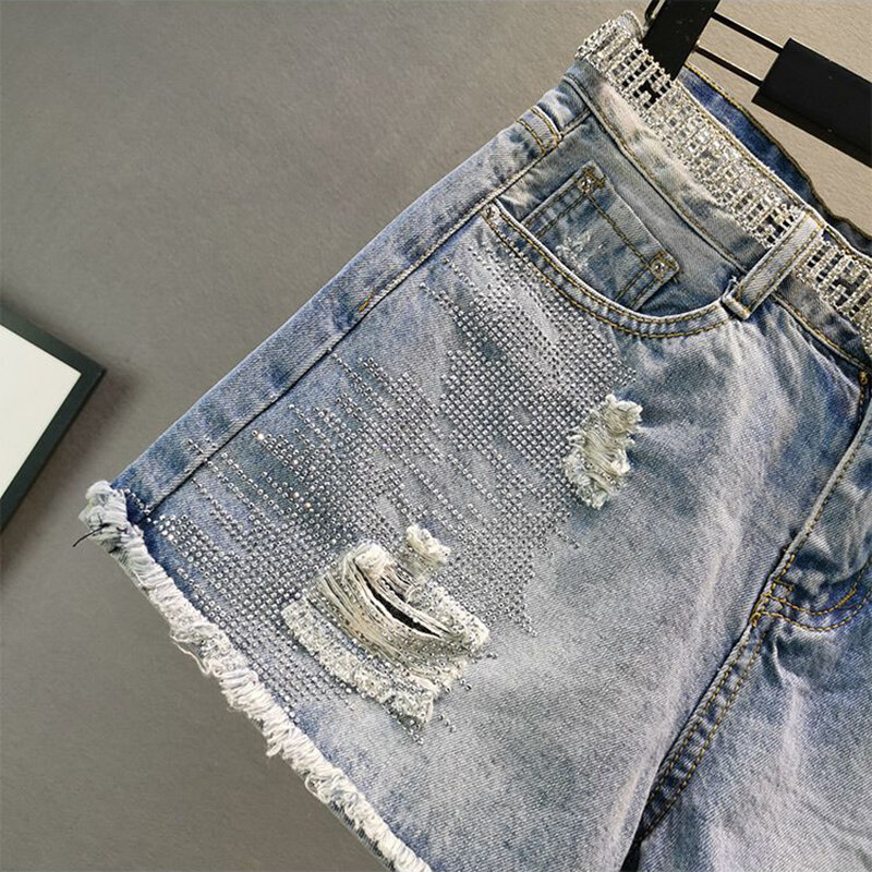 Женские джинсовые шорты с бриллиантами, блестящие шорты с бахромой и дырками, облегающие брюки в стиле ампир, лето 2024