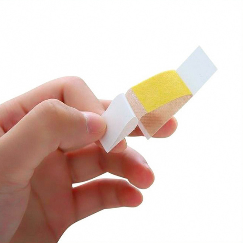 Vendaje adhesivo médico transpirable para primeros auxilios, cinta quirúrgica impermeable para vendaje de heridas, yeso adhesivo, 50 piezas