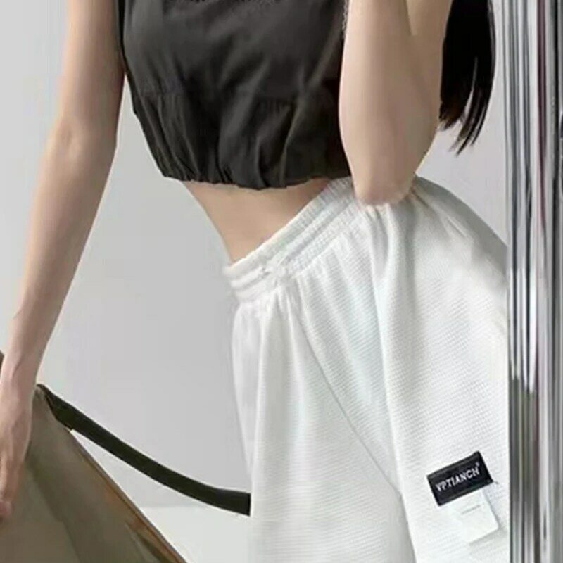 Celana pendek Yoga elastis wanita, celana pendek longgar kasual ukuran besar pinggang tinggi huruf A untuk perempuan