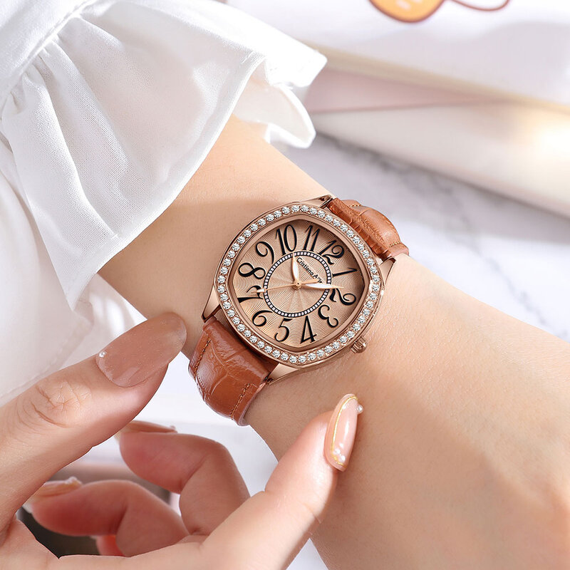 นาฬิกาควอทซ์ไรน์สโตนสำหรับผู้หญิงนาฬิกาหนังหรูนาฬิกาข้อมือแอนะล็อก gaun modis สำหรับผู้หญิงของขวัญวันหยุดสำหรับผู้หญิง
