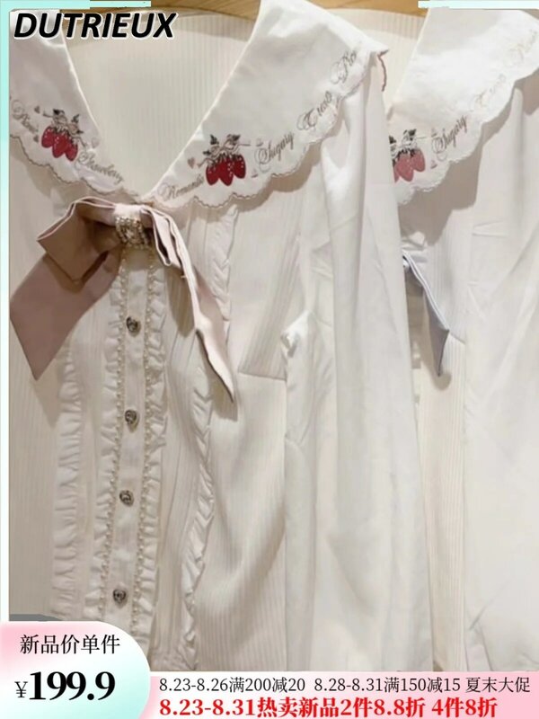 Styl japoński kopalnia masowo produkowana dziewczęca uroczy biały długa koszula słodka truskawkowa haftowana granatowy kołnierzyk bluzka z długim rękawem